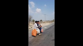 Trained pigeon flies alongside speeding motorcyclist in Pakistan