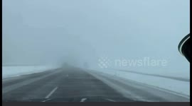 Semi Jacknifes in the middle of a North Dakota Blizzard!