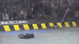Crowds watch robots battle at technology festival in Brazil
