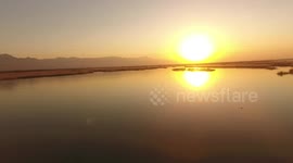 The Setting Sun Shines Over The Sangan River in Zhangjiakou, China