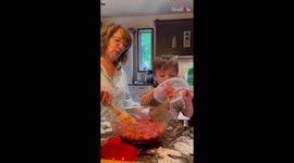 Chaos ensues as messy kid tries making jam with his grandma