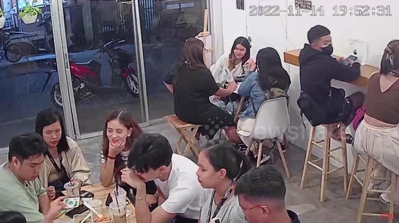 Embarrassing moment clumsy cafe customer falls off stool while leaning ...