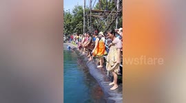 Villagers take part in bizarre skirt race in Thailand