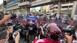 Brave anti-monarchy protesters defy jail as they clash with police during APEC summit in Thailand
