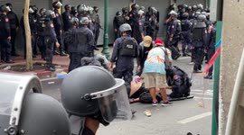 Protester injured after police fire rubber bullets at rally against APEC summit in Thailand