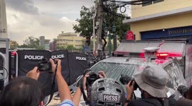 Photographer hit in face by glass bottle as violence erupts outside APEC summit in Thailand