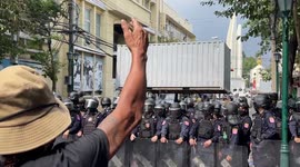 Police use shipping containers to block protesters from APEC summit in Thailand
