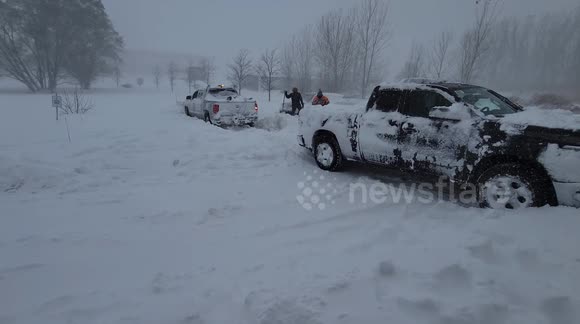 Vehicles under blanket of snow as monster storm hits New York's Buffalo