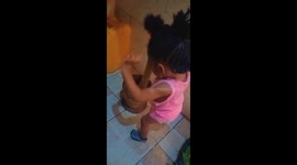 My baby trying to help me in the kitchen always