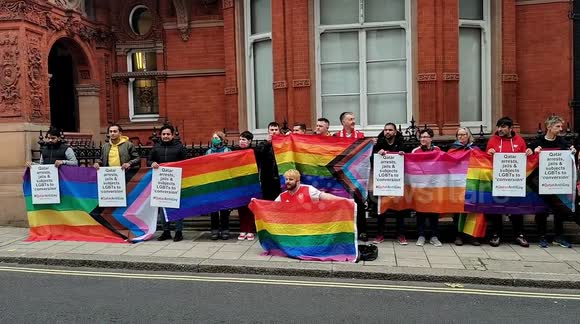 People protest outside London's Qatar embassy with LGBTQ+ flags day before 2022 FIFA World Cup