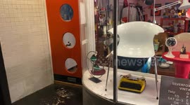 A store window had a decoration which looked like an eyes, nose and face.