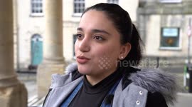 Women cut their hair in Stroud, UK, during vigil in solidarity with women in Iran