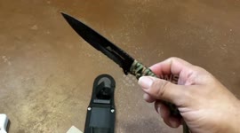 Man uses a $10 knife sharpener for his blades. Easiest way to sharpen a knife.