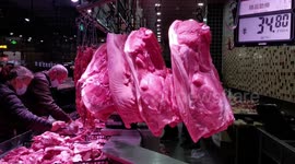 People Buy Pork As Prices Fall At A Supermarket in Yichang, China