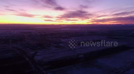 The Rising Sun Shines Over the Ba Shang Saibei Forest Farm in Zhangjiakou, China
