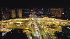 The Illuminated Traffic Flow of Qingchuan Bridge Overpass At Night in Nanning, China