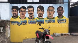 Residents of Rio de Janeiro's favela decorate streets with World Cup graffiti