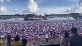 Students bake under harsh sun for hours as Thai province makes Guinness bid for fabric folding