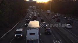 Busy highway I-95 day before Thanksgiving Day holiday with evening sunset.
