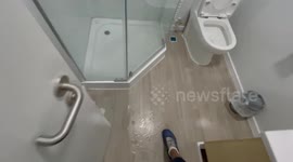 Football fans forced to sleep in £200 a night cabins flooded with water at Qatar fan village