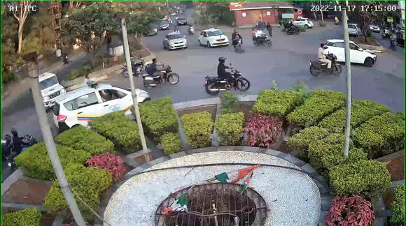 Indian police race to stop drunk motorist driving round busy roundabout