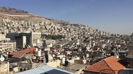 Palestinian Bassel Kettaneh works in the 