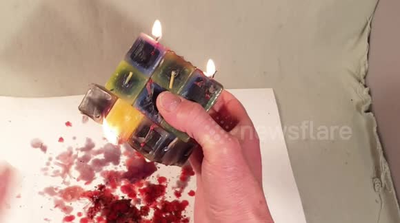 UK man solves fully functional burning Rubik's Cube candle puzzle