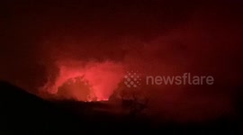 Mauna Loa volcano erupts as lava spews towards US military base