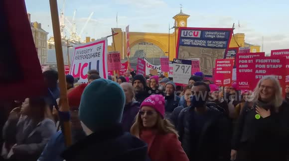 University workers march in London over pay, working conditions and pensions