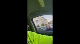 Woman rails at resident over his paid parking spot