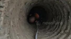 Locals rescue hapless pensioner who fell into dry well while gathering wood in China