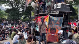 Students from West Papua hold a demonstration in Patung Kuda, Jakarta