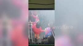 Three young girls stuck in elevator attempt to pull open doors in India