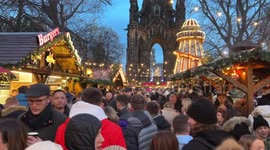 Extremely Busy Christmas Markets in Edinburgh with people packed tight like sardines