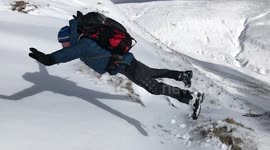 Hiker faceplants spectacularly in the snow in the Brecon Beacons
