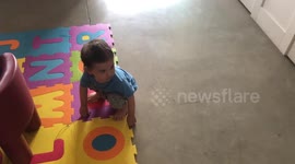 Baby Boy Offers a Flower to his Sister Ella the Bengal Cat