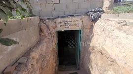 Palestinian woman Fatima Al-Nawaja, displays the homemade products inside an archaeological cave in Khirbet Susiya, south of the West Bank city of Hebron