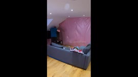 TikTok creator OTB wraps his entire living room in wrapping paper, even the kettle