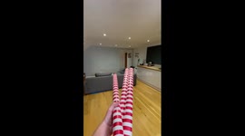 TikTok Creator wraps his entire living room in christmas wrapping paper (Before and After)