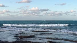 Catching some waves by the shore of the Bahamas
