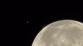 Mars seen going behind Full Moon