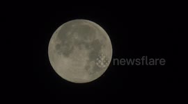 Mars reappears from behind the December Full Moon also known as the Cold Moon