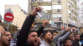 Police shooting of Greek Roma boy: Angry protesters burn 20 euro notes outside courthouse