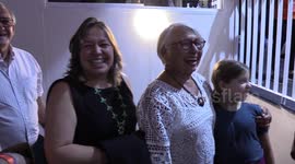 Visitors react to Roda Rico, the largest ferris wheel In Latin America, in Sao Paulo, Brazil