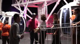 Visitors reaction to Roda Rico, the largest Ferris wheel in Latin America, in Sao Paulo, Brazil