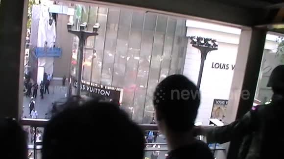 Scuffles in Bangkok on the first day of the 2014 coup after military arrest a protester