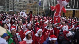 1000s of Santas descended on New York’s Midtown for the annual Santacon