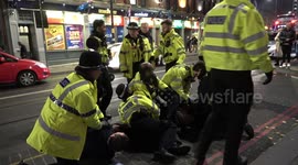 Two men are dramatically arrested during altercation outside Birmingham nightclub after England are kicked out of the World Cup