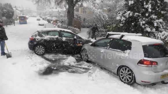 Vehicles crash and motorists abandon cars as heavy snow hits Gloucestershire, UK