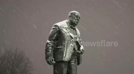 Snow falls on the statue of Winston Churchill located in Woodford Green it ends up with a snowball being thrown at him